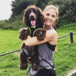 Laura with dog in arms